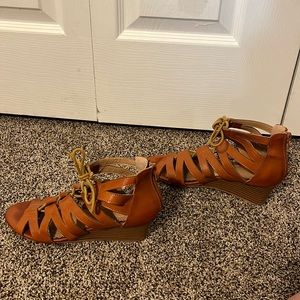 Restricted Brown Lace-Up Wedges